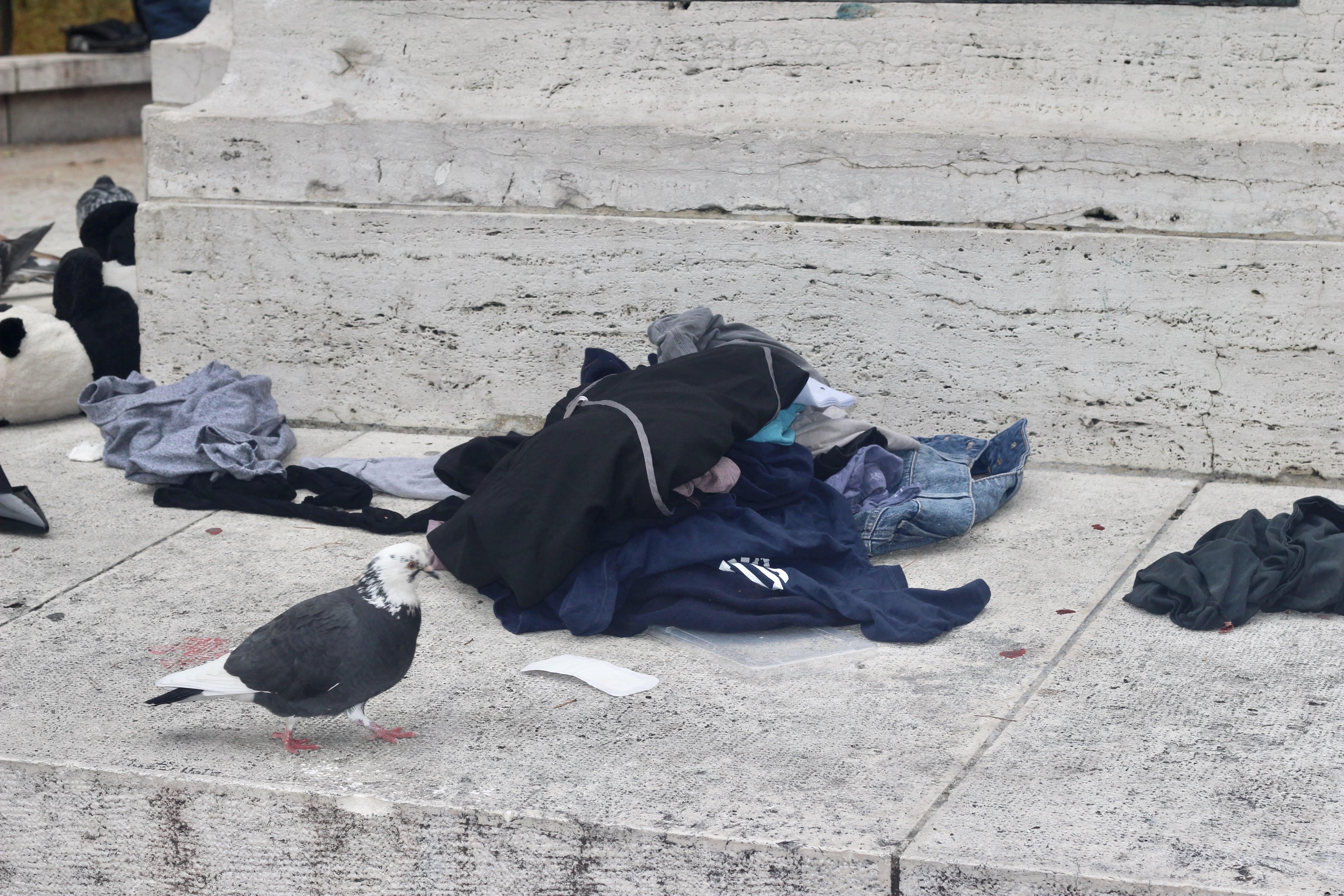 Clothes bundled up on the floor